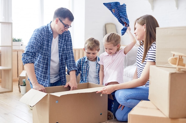 Packing Moving Boxes with Children