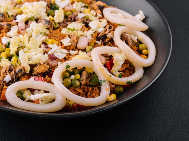 Pad thai with squid rings on a plate