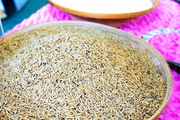 Paddy rice on threshing basket