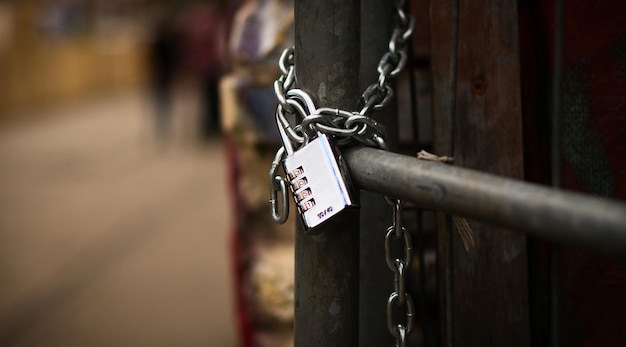 Padlock on a chain Locked and locked mysterious and safe Detail