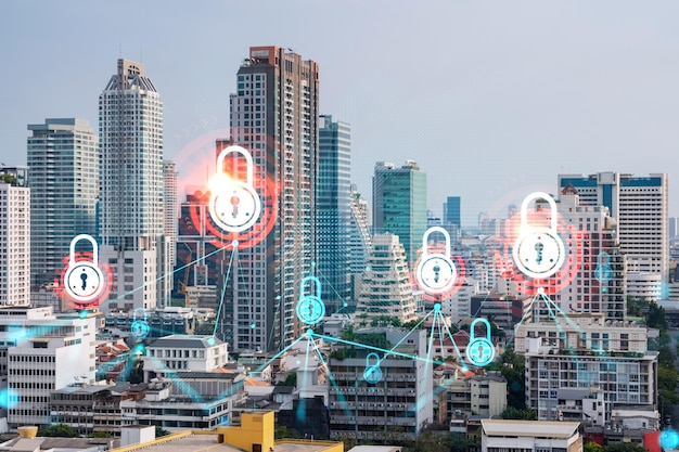 Padlock icon hologram over panorama city view of bangkok to\
protect business in asia the concept of information security\
shields double exposure