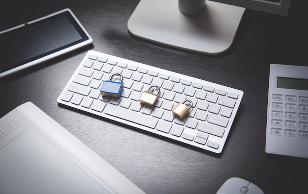 Padlocks on the computer keyboard. Security