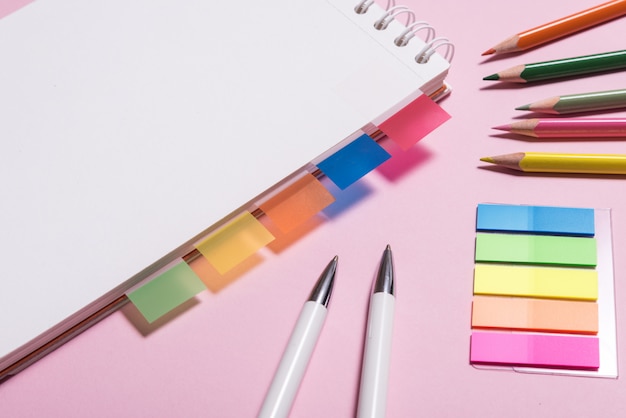 Page markers on office desk, top view, copy space