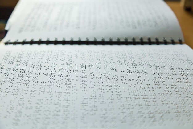 Page written in braille alphabet for blind people