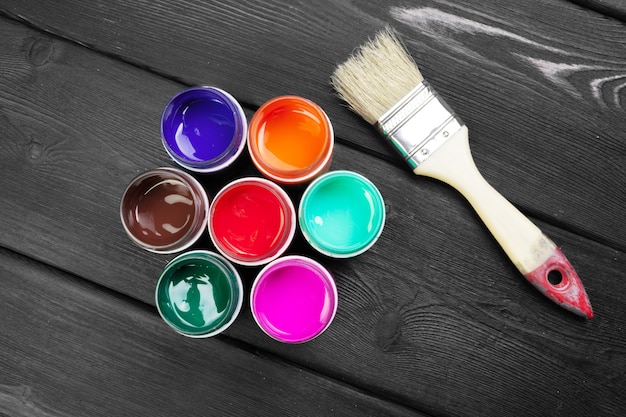 paint bottels on rustic wooden table