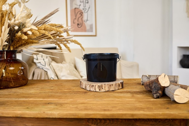 Paint brush and color bucket on the wood in room