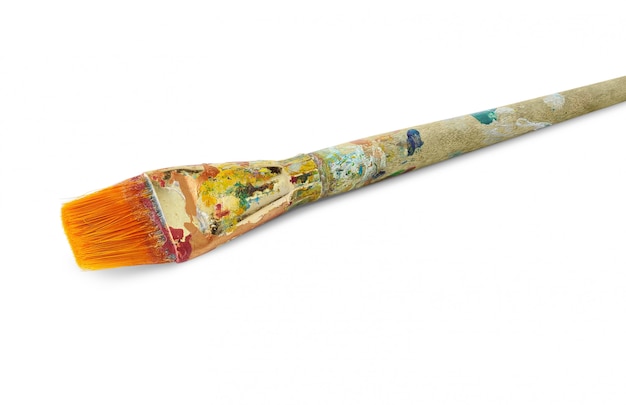 Photo paint brush with colorful spots of oil paint isolated on white