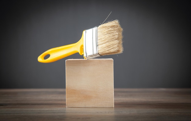 Paint brush on the wooden table