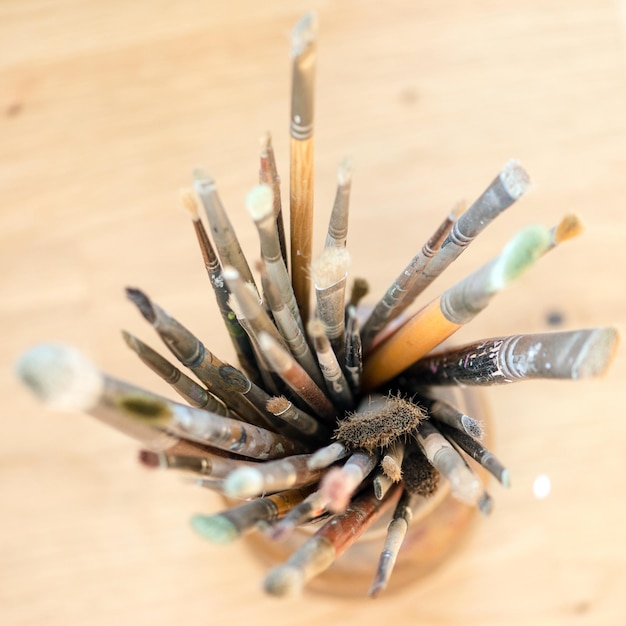 Paint brushes in a jar