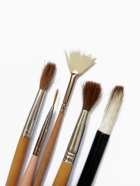 Photo paint brushes on white background