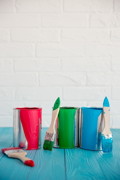 Paint can on wooden table. Spring renovation concept