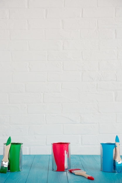 Paint can on wooden table. Spring renovation concept