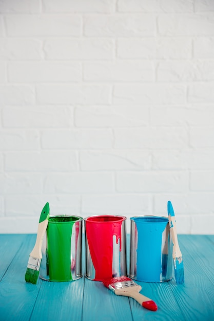 Paint can on wooden table. Spring renovation concept