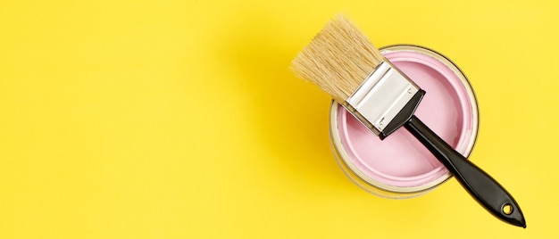 Paint cans and paint brushes and how to choose the perfect interior paint color and good for health