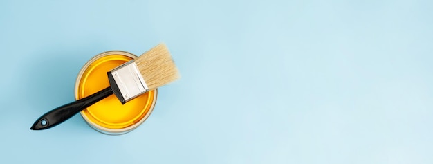 Paint cans and paint brushes and how to choose the perfect interior paint color and good for health