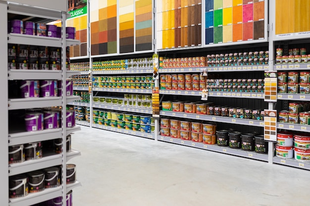  paint shop with a large selection of products from many manufacturers of different colors.