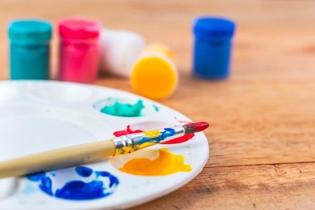 Photo paintbrush on table