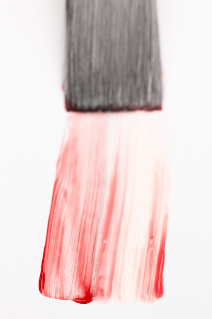 Photo paintbrush with red brush stroke