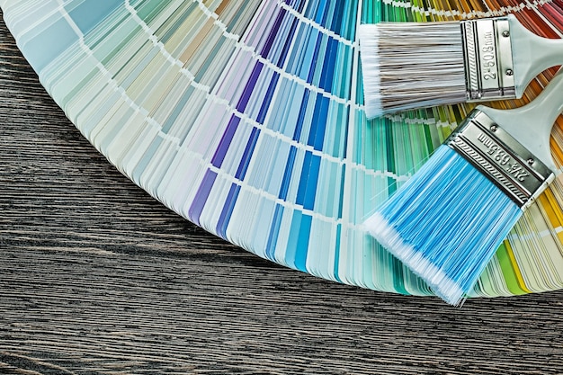 Paintbrushes pantone fan on wood board