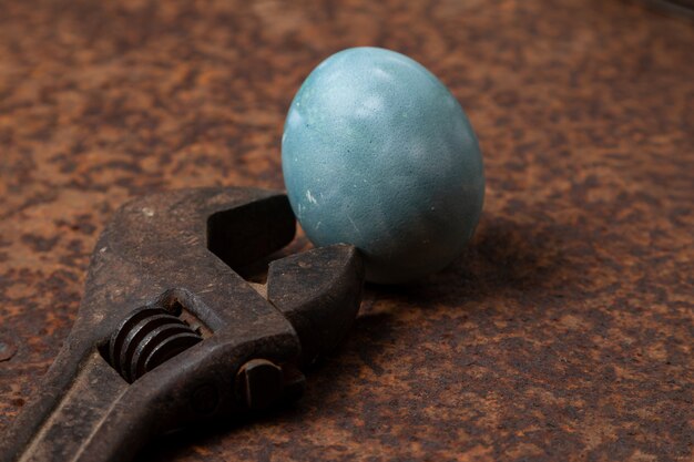 Painted Easter eggs with old hands tools.