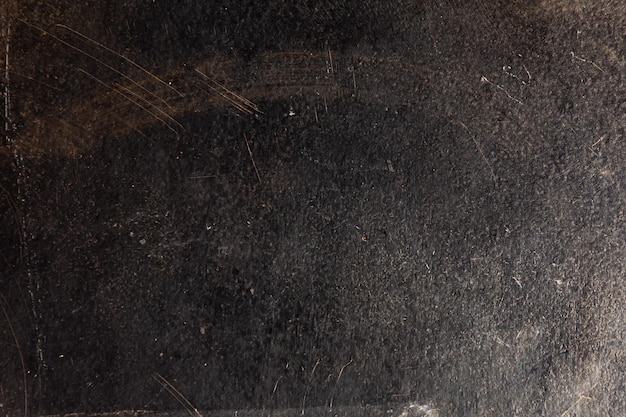 Painted grunge metal background or texture with scratches and cracks