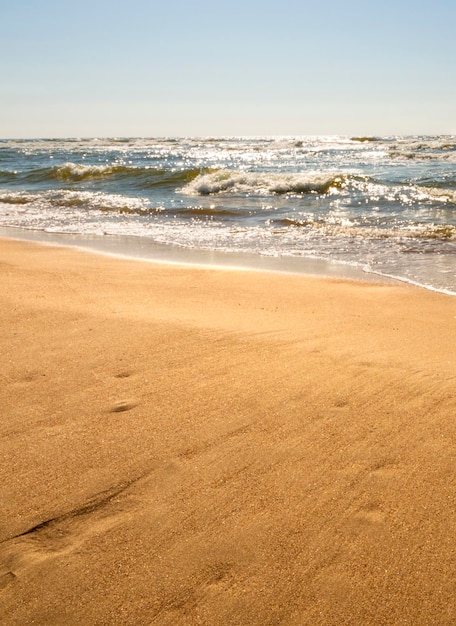 Painted heart on the golden sand of the Baltic beach in Palanga Lithuania