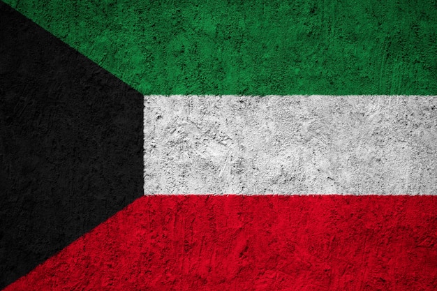 Bandiera nazionale dipinta del kuwait su un muro di cemento