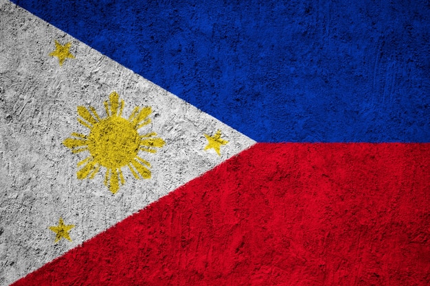 Photo painted national flag of philippines on a concrete wall