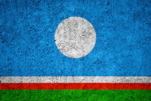 Painted national flag of Sakha on a concrete wall