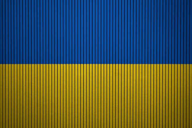 Painted national flag of Ukraine on a concrete wall