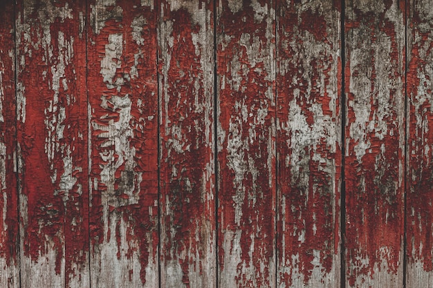 Photo painted old wooden red wall background.