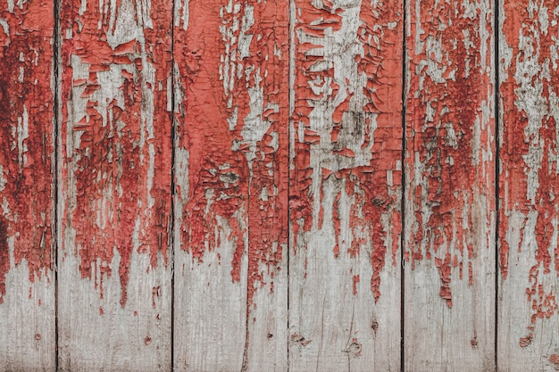 Painted old wooden red wall background.