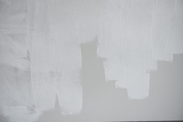 Painted wall background, Painter painting a house wall with a paint poller