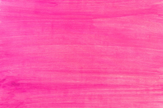 Painted with pink color paint wood background.