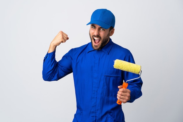 Painter man holding a paint roller