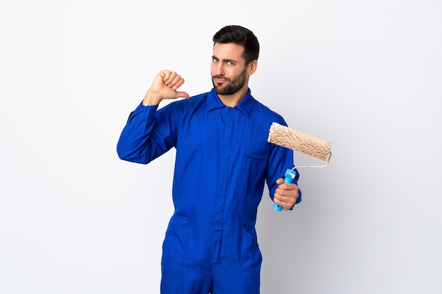 Painter man holding a paint roller