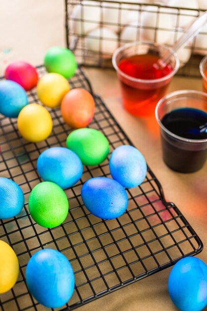 Painting Easter eggs with bright colors.