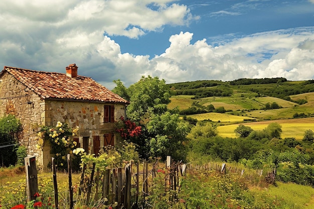 Foto un dipinto di una fattoria in campagna