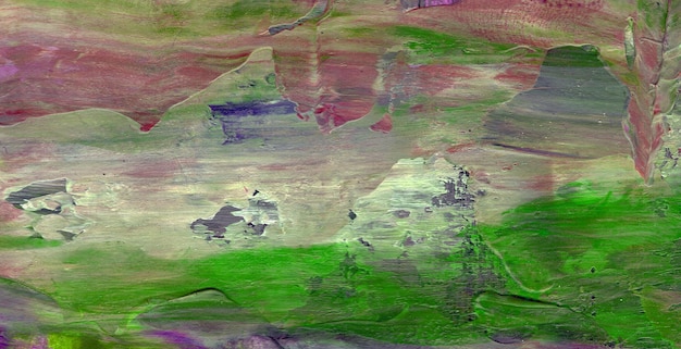 A painting of a mountain in green, pink, and purple.