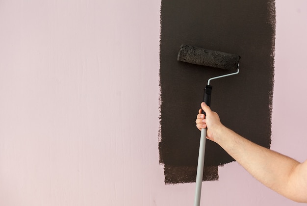 Painting a wall in black color