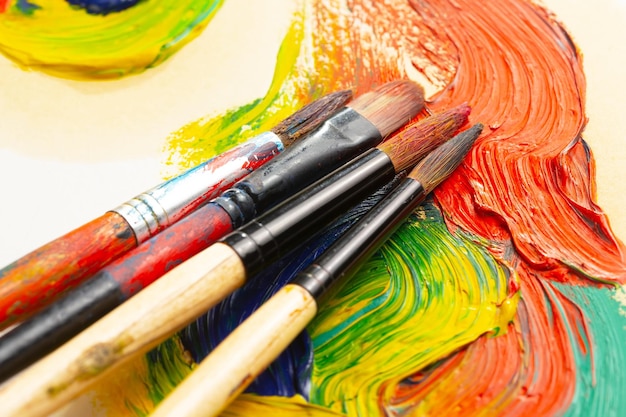 Premium Photo  Row of artist paint brushes on background