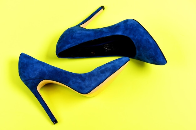 Pair of blue suede high heel shoes