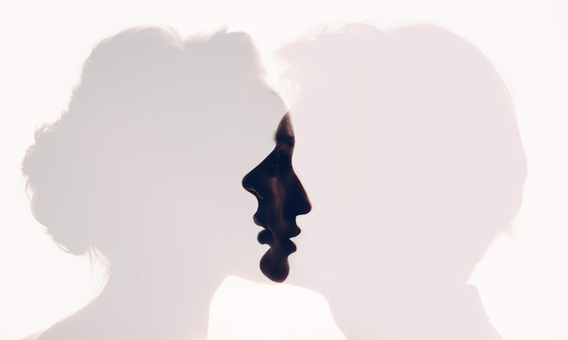 Pair couple man and woman profile portrait face to face Family psychologist and healthy relationships concept