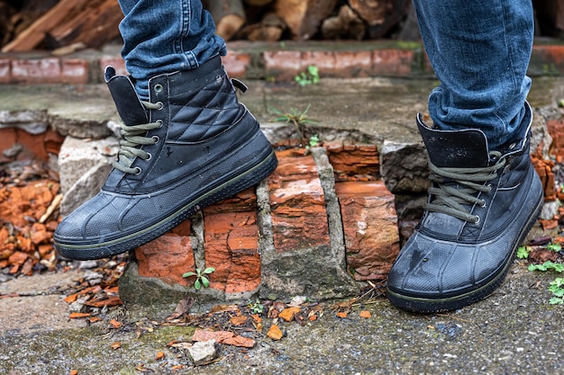 Photo a pair of durable men39s boots legs closeup