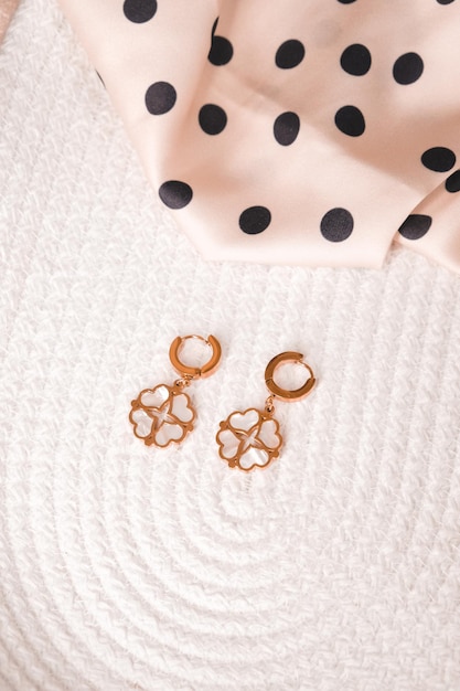 A pair of earrings from the brand lily.