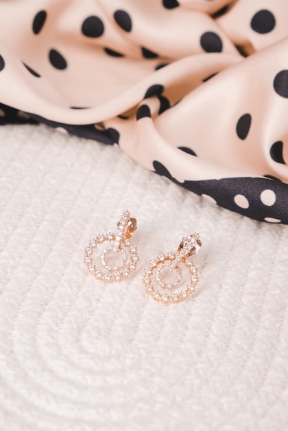 A pair of earrings from the brand new collection