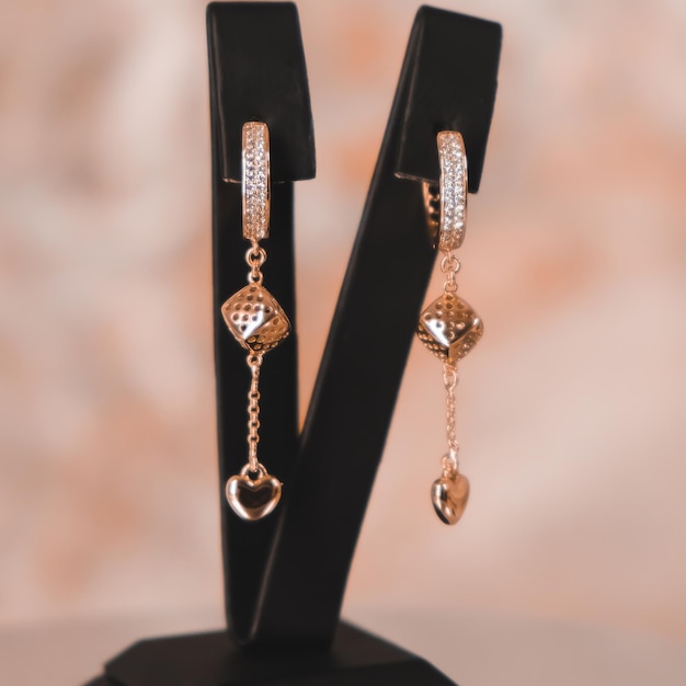 A pair of gold and diamond earrings