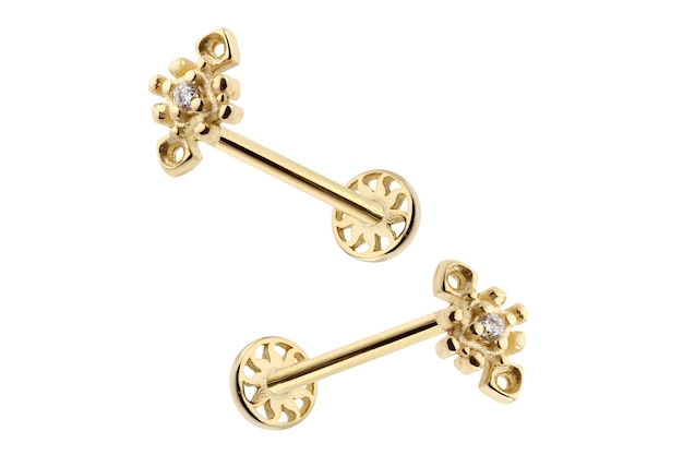 A pair of gold earrings with a diamond on the front.