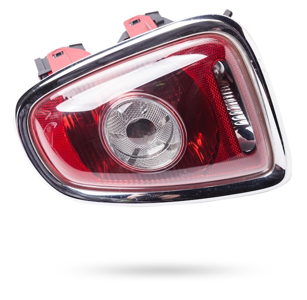 A pair of headlights of a stop signal for a German auto optical equipment of white and red color on a white isolated background A spare part for repair and sale in a car service center