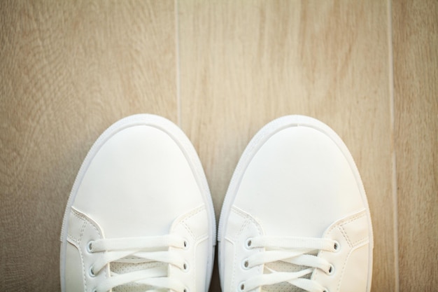 Photo pair of new stylish white sneakers